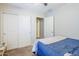 This bedroom features a closet and a comfortable bed at 2717 W Bowker St, Phoenix, AZ 85041