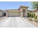 Charming single-story home featuring a two-car garage and stone-accented entryway at 2717 W Bowker St, Phoenix, AZ 85041