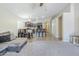 Open-concept living room showcases dining area and views into the adjacent kitchen at 2717 W Bowker St, Phoenix, AZ 85041