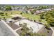 Aerial view of a neighborhood park, including a basketball court, playground, and shaded picnic area at 2717 W Bowker St, Phoenix, AZ 85041