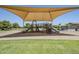 Community playground with slides and overhead shade covering at 2717 W Bowker St, Phoenix, AZ 85041