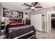 Cozy bedroom with ceiling fan and ample natural light at 2749 W San Juan Ave, Phoenix, AZ 85017