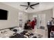 Spacious bedroom with ceiling fan and open doorways to other rooms in the home at 2749 W San Juan Ave, Phoenix, AZ 85017