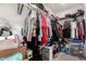 Walk-in closet with shelving, clothing racks, and ample storage for personal belongings at 2749 W San Juan Ave, Phoenix, AZ 85017