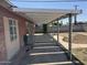 Backyard covered patio with decorative support beams at 3006 W Stella Ln, Phoenix, AZ 85017
