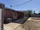 Spacious covered back patio is perfect for outdoor relaxation overlooking the yard at 3006 W Stella Ln, Phoenix, AZ 85017