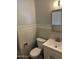 Bathroom features a modern vanity, sleek fixtures, and a mirror for added space at 3006 W Stella Ln, Phoenix, AZ 85017