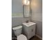 Bathroom features a modern vanity, sleek fixtures, and updated tiling at 3006 W Stella Ln, Phoenix, AZ 85017