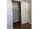 Bedroom closet boasts plenty of storage space with included shelving and hanging rod at 3006 W Stella Ln, Phoenix, AZ 85017
