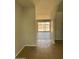 Inviting foyer featuring tile flooring and arched doorways, seamlessly transitioning to a light-filled living space at 3006 W Stella Ln, Phoenix, AZ 85017
