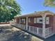 Brick home featuring decorative white fence, with meticulous architectural details for a timeless look at 3006 W Stella Ln, Phoenix, AZ 85017