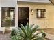 Well-maintained entryway with lush greenery and clearly marked unit number at 3420 W Danbury Dr # C130, Phoenix, AZ 85053