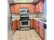 Well-lit kitchen featuring stainless steel appliances and ample countertop space at 3420 W Danbury Dr # C130, Phoenix, AZ 85053