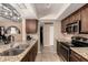 Well-equipped kitchen featuring granite countertops, stainless steel appliances, and ample cabinet space at 3529 W Saint Moritz Ln, Phoenix, AZ 85053
