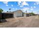 View of backyard featuring a private garage and gate entry at 414 E Westchester Dr, Tempe, AZ 85283