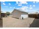 Spacious backyard with a detached storage shed and covered patio area, perfect for outdoor activities at 414 E Westchester Dr, Tempe, AZ 85283