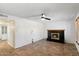 Inviting living room features tile flooring and cozy fireplace at 414 E Westchester Dr, Tempe, AZ 85283