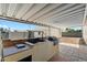 Charming outdoor kitchen area with built-in grill, perfect for entertaining and enjoying outdoor meals at 414 E Westchester Dr, Tempe, AZ 85283