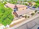 Backyard featuring a covered patio with BBQ, a privacy fence, and desert landscaping at 4199 E Citrine Rd, San Tan Valley, AZ 85143