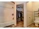 Bright bathroom with a shower-tub combination and access to a walk-in closet with ample storage at 4199 E Citrine Rd, San Tan Valley, AZ 85143