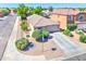 Inviting single-story home featuring desert landscaping, a concrete driveway, and shade trees at 4199 E Citrine Rd, San Tan Valley, AZ 85143