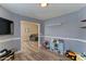 Charming playroom with gray walls and view of the living room, perfect for children at 4199 E Citrine Rd, San Tan Valley, AZ 85143