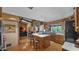 Open concept kitchen with an island, warm wood cabinetry and stainless steel appliances at 426 E Carol Ann Way, Phoenix, AZ 85022
