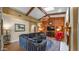 Bright living room with hardwood floors, a fireplace, comfortable seating, and stylish decor at 426 E Carol Ann Way, Phoenix, AZ 85022