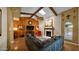 Spacious living room with vaulted ceilings, wood accents, and a cozy fireplace at 426 E Carol Ann Way, Phoenix, AZ 85022