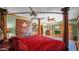 Elegant main bedroom with a four-poster bed, decorative art, and plenty of space at 426 E Carol Ann Way, Phoenix, AZ 85022