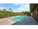 Inviting in-ground pool with tiled surround, perfect for relaxation and enjoying the outdoor space at 426 E Carol Ann Way, Phoenix, AZ 85022
