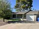 Beautiful home with lush landscaping, mature trees, and a welcoming facade at 4539 N 18Th Ave, Phoenix, AZ 85015