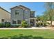 Charming two-story home with a well-manicured lawn and desert landscaping for curb appeal at 4712 E Bonanza Rd, Gilbert, AZ 85297