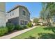 Charming two-story home with a well-manicured lawn and desert landscaping at 4712 E Bonanza Rd, Gilbert, AZ 85297