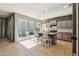 Bright kitchen featuring stainless steel appliances, tile floors, and a spacious center island at 4712 E Bonanza Rd, Gilbert, AZ 85297
