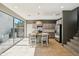 Bright kitchen with stainless steel appliances, kitchen island and access to the backyard at 4712 E Bonanza Rd, Gilbert, AZ 85297