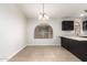 Dining room with tile floors adjacent to kitchen at 515 E Sherri Dr, Gilbert, AZ 85296
