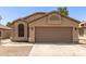 Single story home featuring a two car garage and neutral color palette at 515 E Sherri Dr, Gilbert, AZ 85296