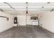 A spacious garage with ample storage and laundry facilities at 515 E Sherri Dr, Gilbert, AZ 85296