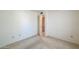 Carpeted bedroom interior featuring a doorway at 5800 S College Ave, Tempe, AZ 85283