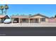 Charming single-story home featuring a covered front porch and desert landscaping at 5800 S College Ave, Tempe, AZ 85283