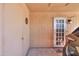 Spacious garage with an entrance door, ideal for parking and extra storage with some wall decor at 5800 S College Ave, Tempe, AZ 85283