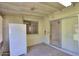 Bright enclosed patio with a window and sliding door leading indoors, providing a seamless transition at 5800 S College Ave, Tempe, AZ 85283