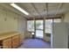 Enclosed patio with plenty of natural light, perfect for relaxing with sliding door and serving area at 5800 S College Ave, Tempe, AZ 85283