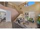 Inviting living area with a second-floor view, sliding glass doors, and an open layout, bringing in natural light at 7246 W Monte Cristo Ave, Peoria, AZ 85382
