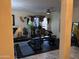 This versatile living space is equipped with fitness equipment at 9911 W Riverside Ave, Tolleson, AZ 85353