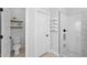 Bright bathroom featuring a toilet, shower with a niche, and open door for ample space at 9918 E Escondido Ave, Mesa, AZ 85208