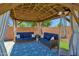 Relaxing outdoor cabana with comfortable seating and heaters, perfect for entertaining at 9918 E Escondido Ave, Mesa, AZ 85208