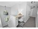 Bright hallway with a small study nook area featuring a built-in desk at 9918 E Escondido Ave, Mesa, AZ 85208