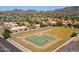 Aerial view of the community with recreational facilities like tennis and basketball courts at 10410 N Cave Creek Rd # 2229, Phoenix, AZ 85020